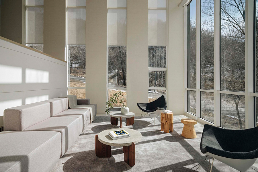 Minimalist hotel furniture collection, featuring sleek designs for guest room spaces. Perfect for modern, understated luxury hospitality interiors.